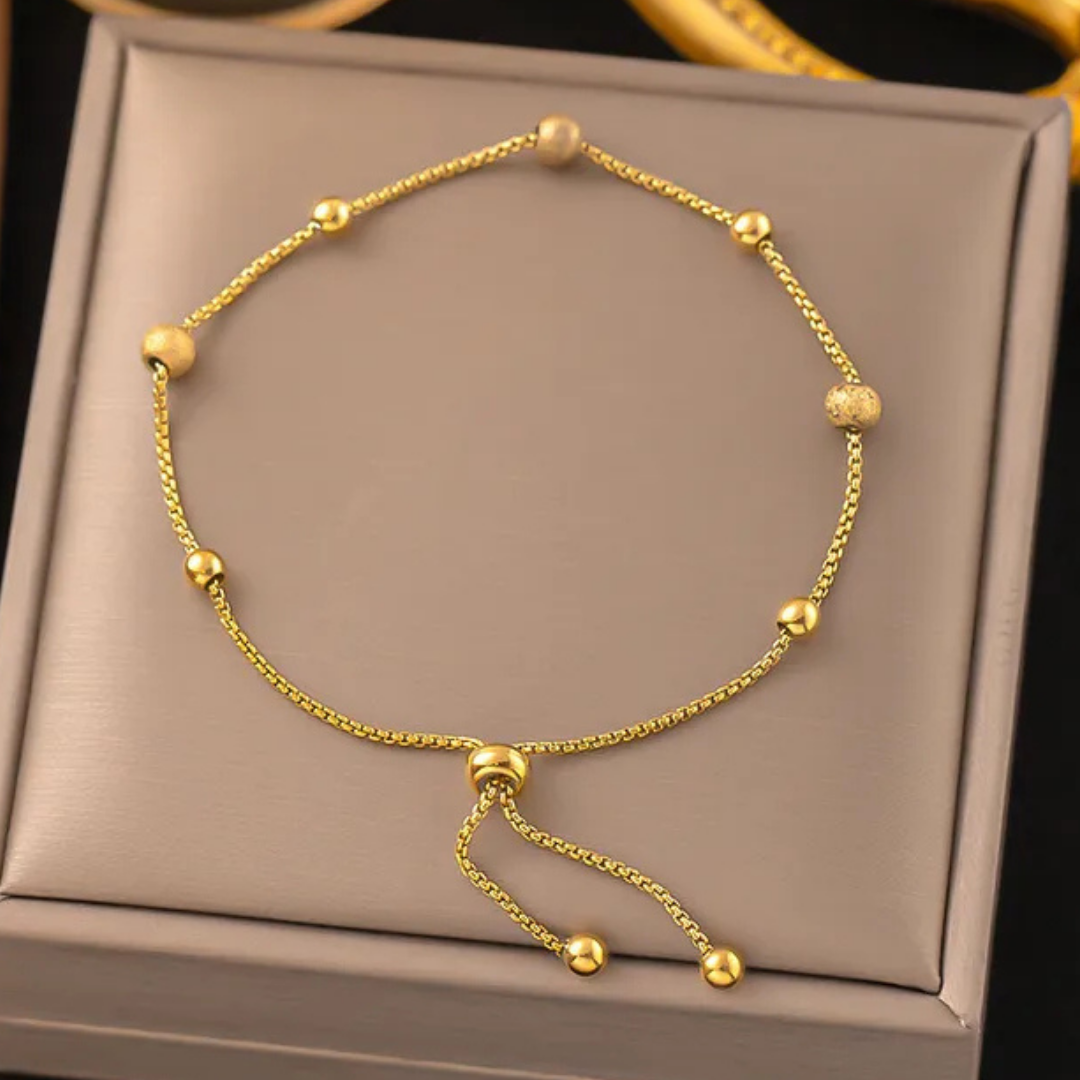 PULSERA CLAPTON BOLITAS