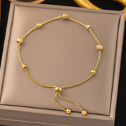 PULSERA CLAPTON BOLITAS