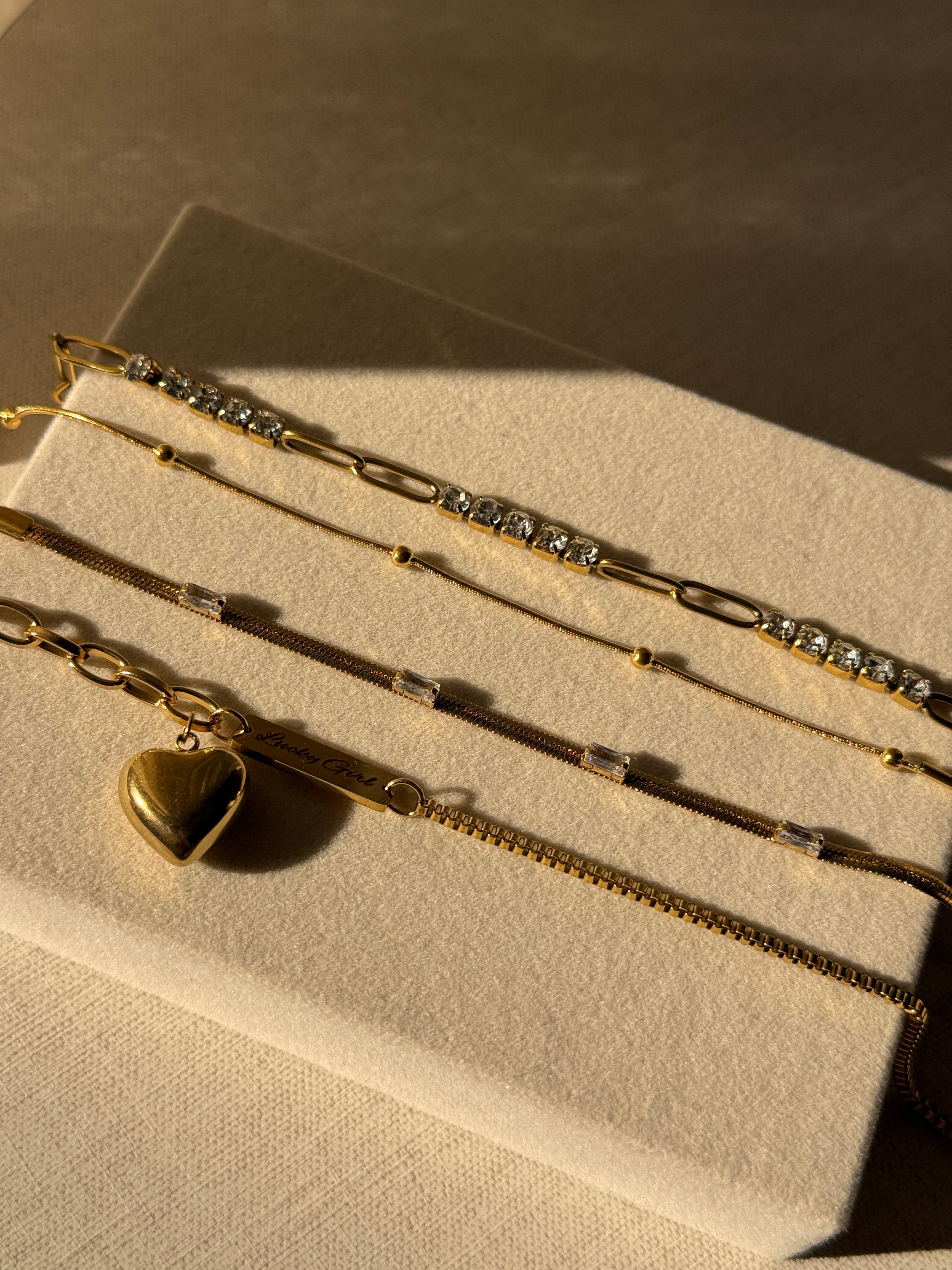 PULSERAS DORADAS