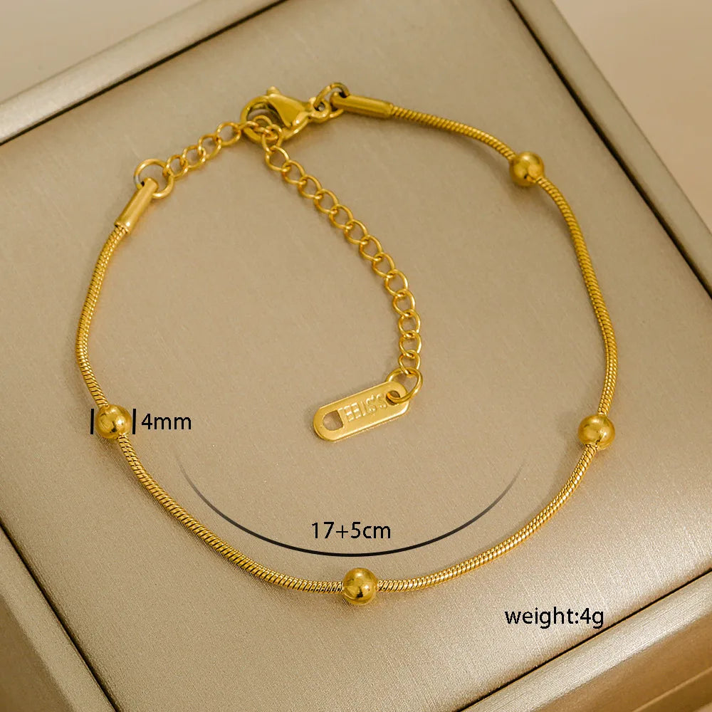 PULSERA CLAPTON BOLITAS CIERRE CLASICO