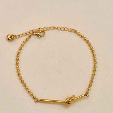 PULSERA NUDO GOLD