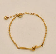 PULSERA NUDO GOLD