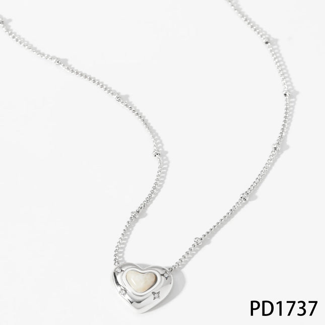 COLLAR CORAZON ESTRELLADO NACAR SILVER