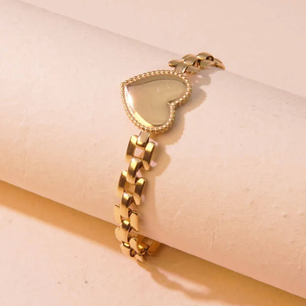 PULSERA HEART TRAMADA GOLD