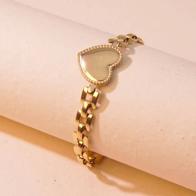 PULSERA HEART TRAMADA GOLD