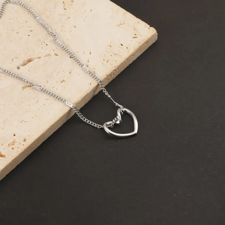 COLLAR CORAZON CALADO