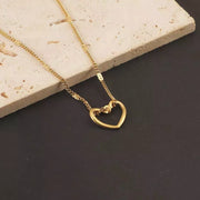 COLLAR CORAZON CALADO